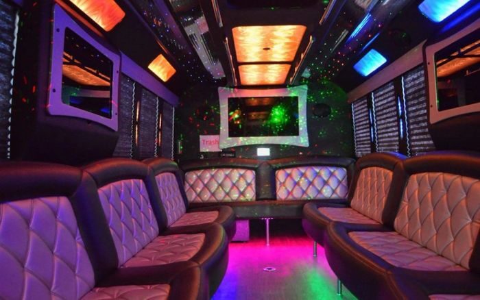 Party bus lounge with LED ceiling – Laramie limo service
